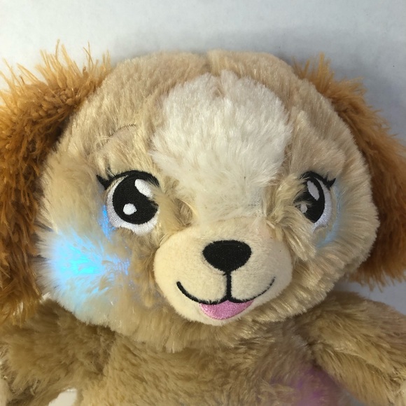 Lullabrites puppy plush plays 3 songs for bedtime. Changes to different lights. - Picture 6 of 9